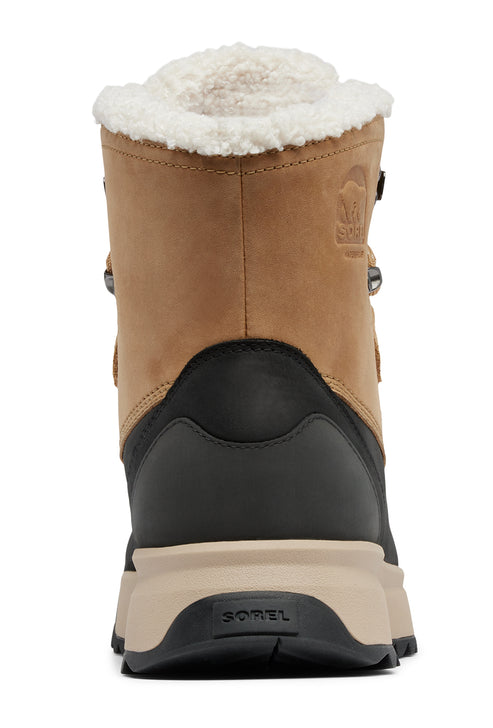 Back view of a tan and black hiking boot with a white faux fur collar and the text "SOREL" on the sole.