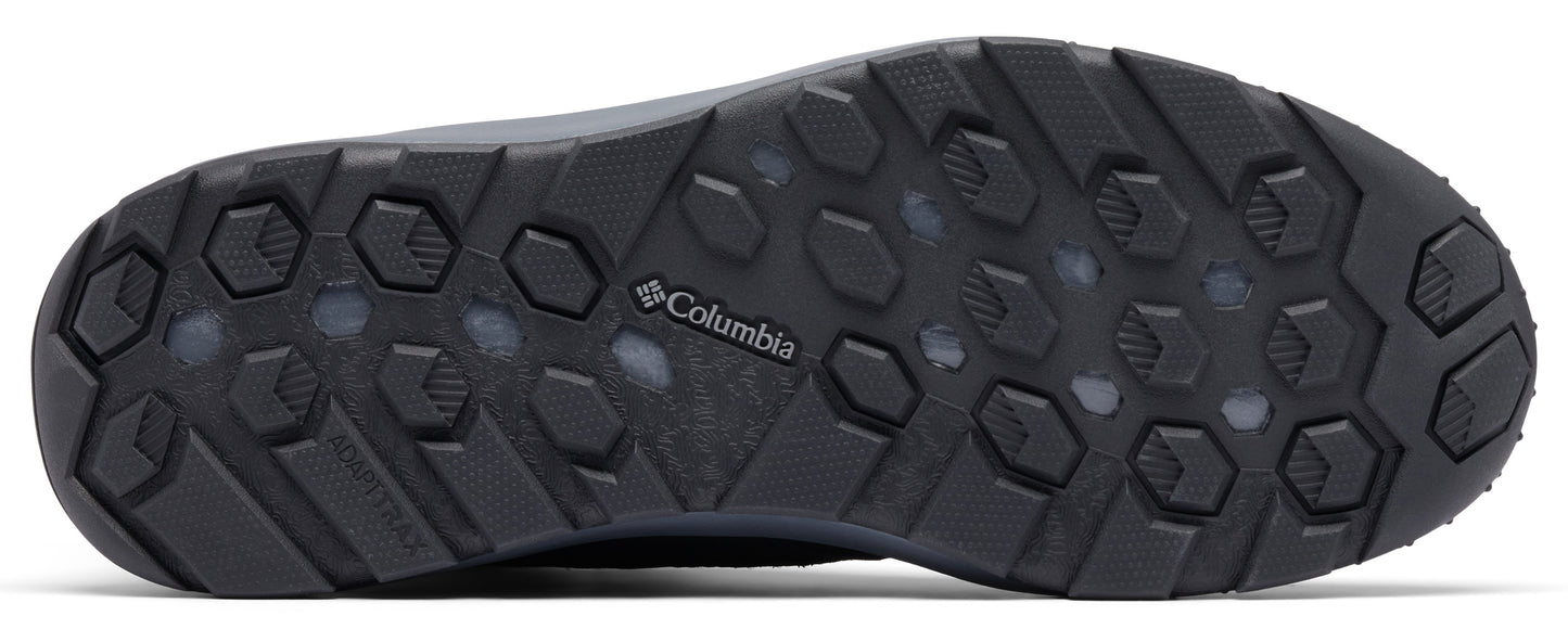 The bottom of a shoe with a dark tread pattern and the word "Columbia".