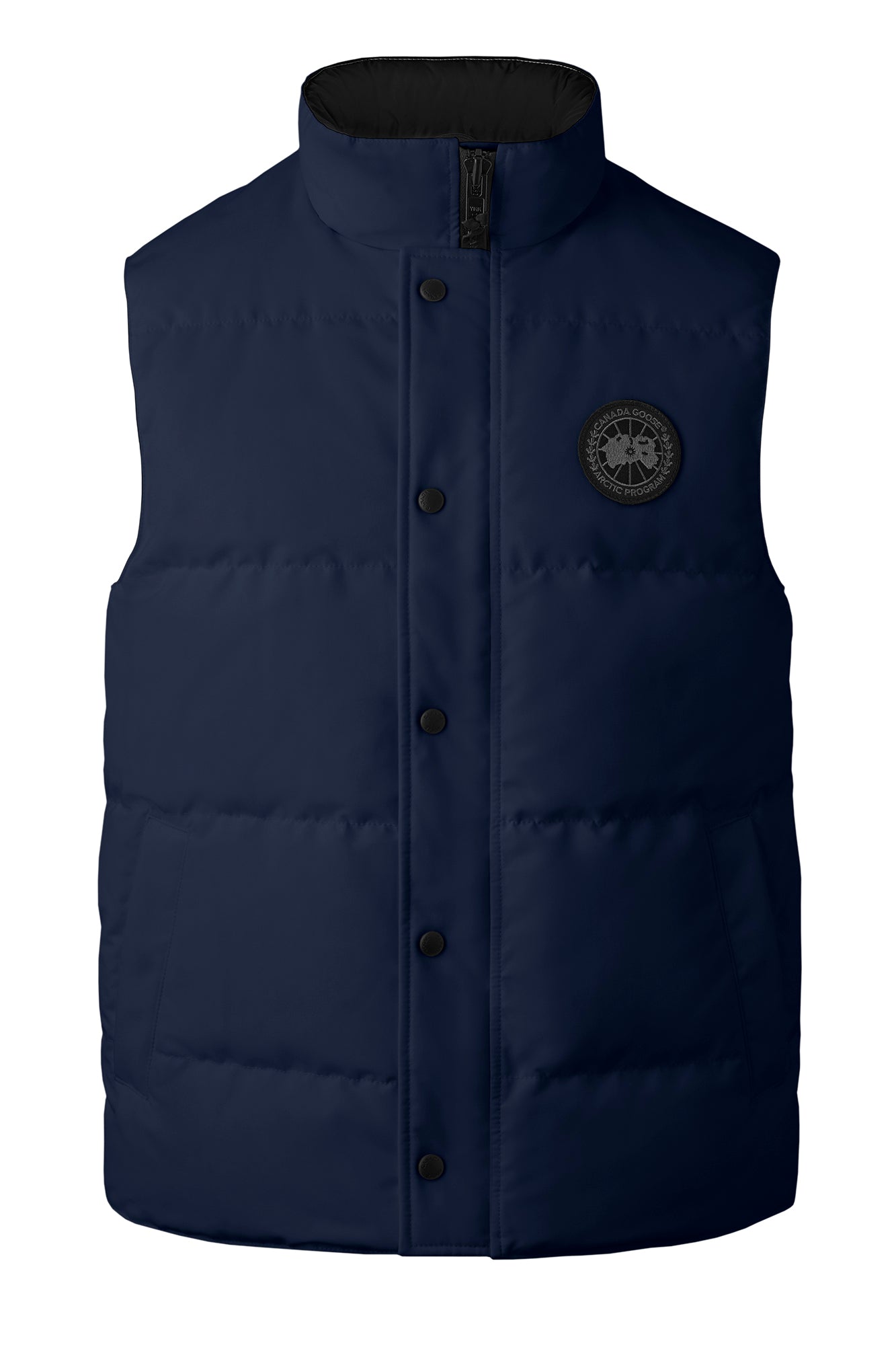 Navy puffer vest with black button closures and a circular logo on the right chest.