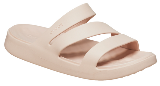 Side view of a blush-colored sandal with a flat sole and two thick straps.