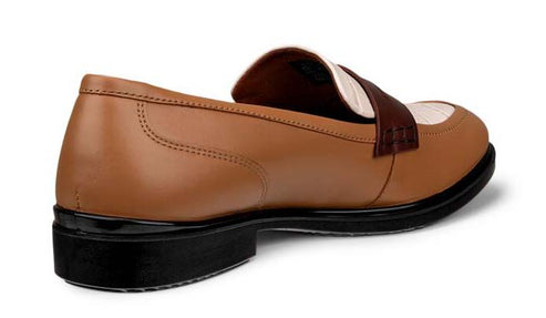 Tan leather loafer with brown and white accents and a black sole.