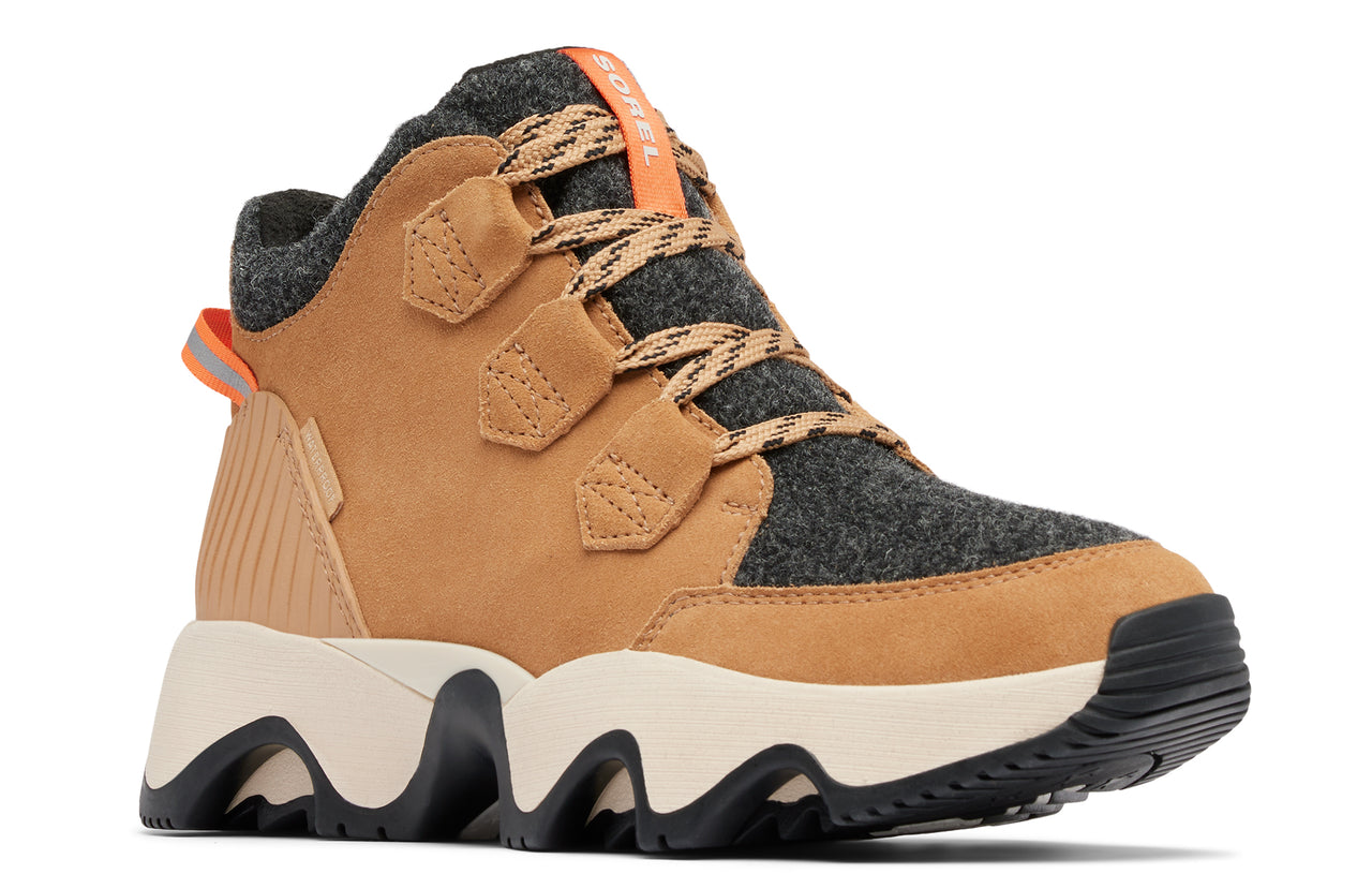 Tan suede and wool ankle boot with sculptural cream-colored sole and orange accents.