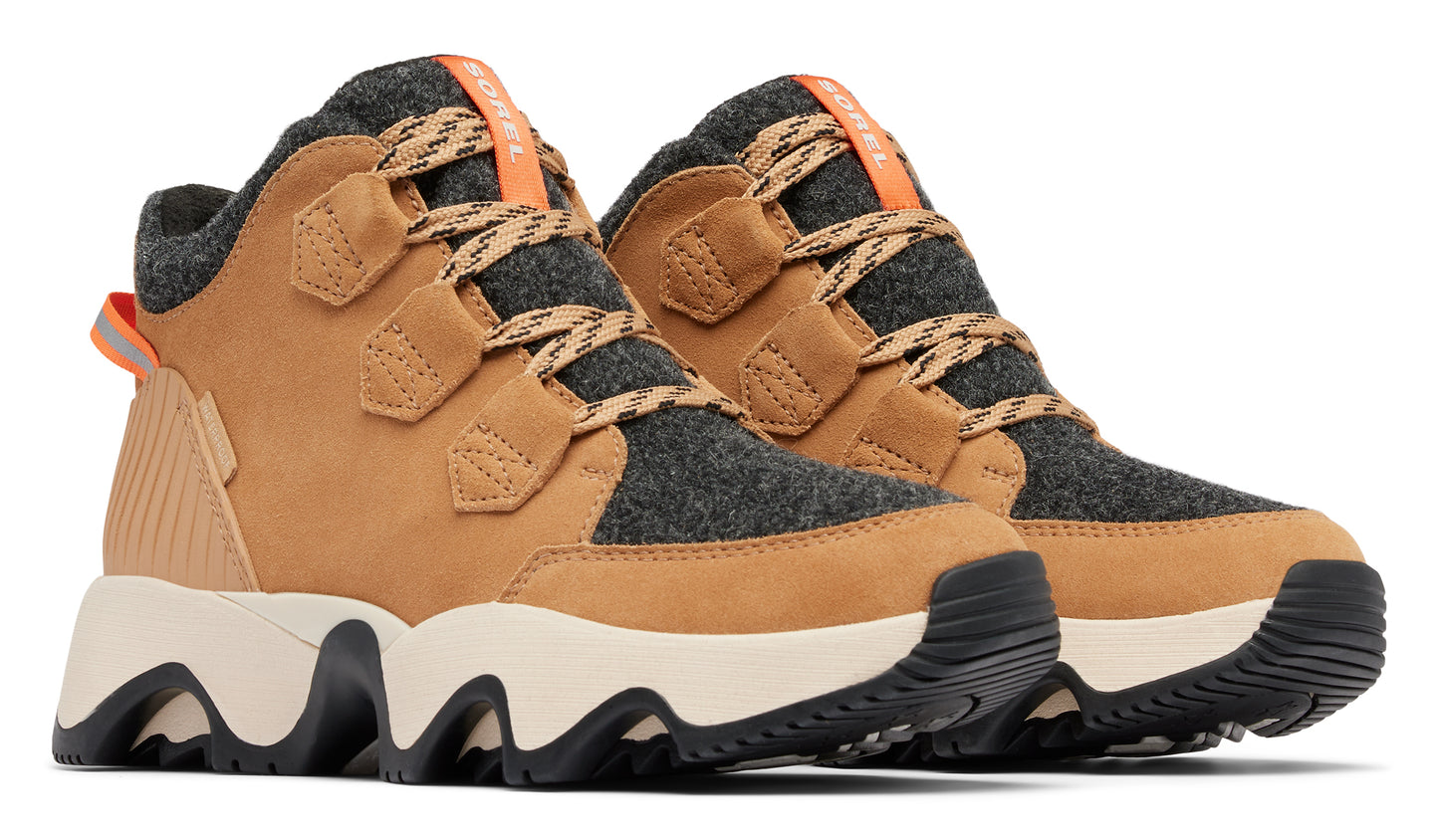 Pair of ankle-high tan boots with gray wool trim and off-white soles.