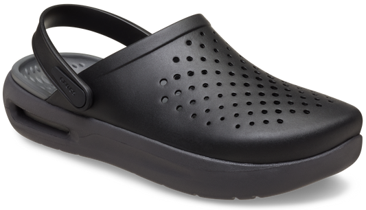 Black clog style shoe with rounded perforated toe and pivoting heel strap.