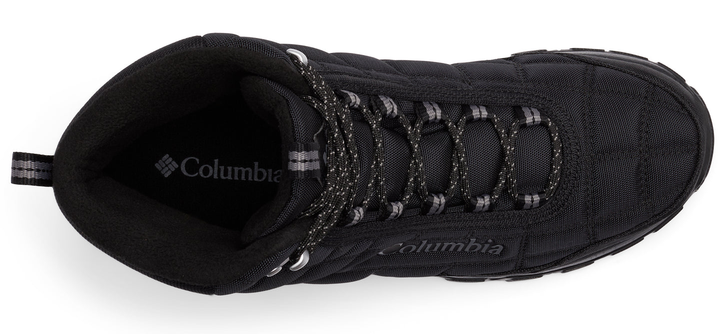 Top-down view of a black quilted boot with black and gray laces.