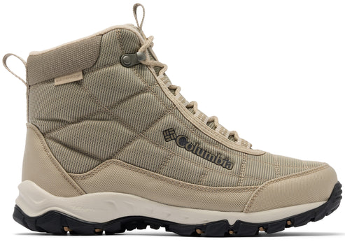 A tan Columbia waterproof high-top hiking boot with a quilted side pattern, lace-up front, a white midsole, and a black, lugged rubber outsole.
