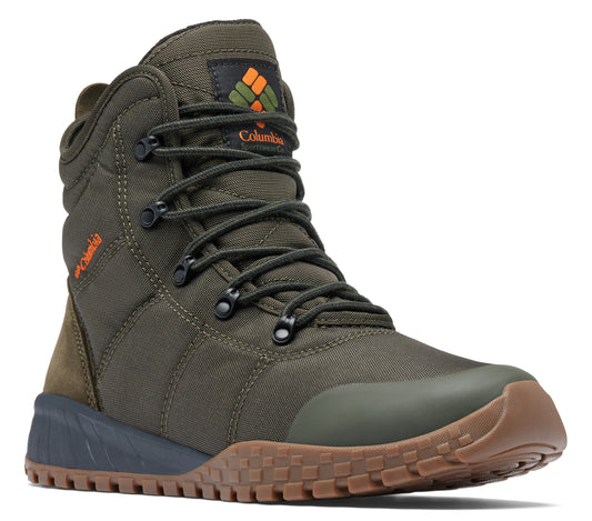 High top green hiking boot with brown rubber sole, black laces and orange logo.