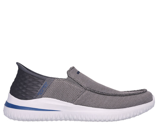 Gray slip-on shoe with a white sole and blue stripe detail.