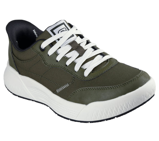 Olive colored sneaker with white laces and thick white sole.