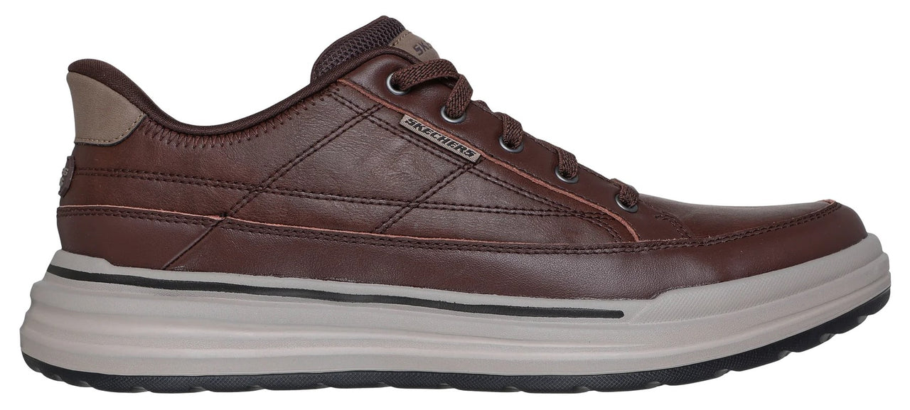 A brown casual shoe with a light gray sole.