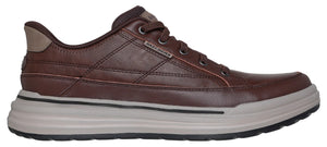 A brown casual shoe with a light gray sole.