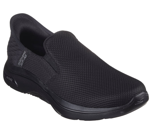 Black slip-on shoe with mesh upper and arch support.