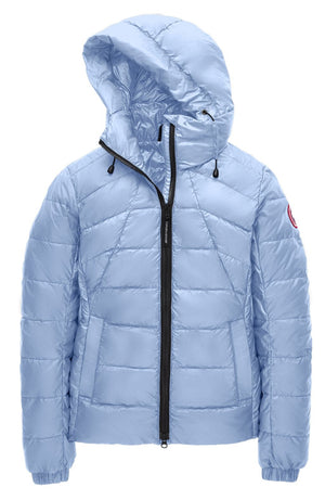 Light blue quilted puffer jacket with a hood and black zipper.