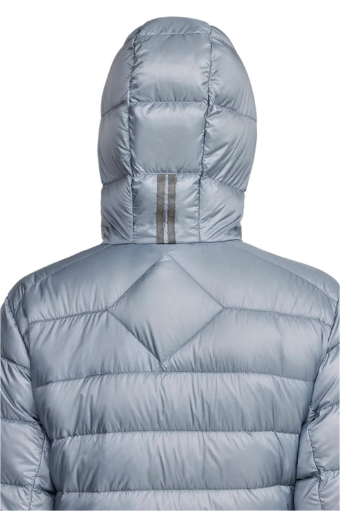 Back view of a silver hooded puffer jacket with a reflective stripe on the hood.