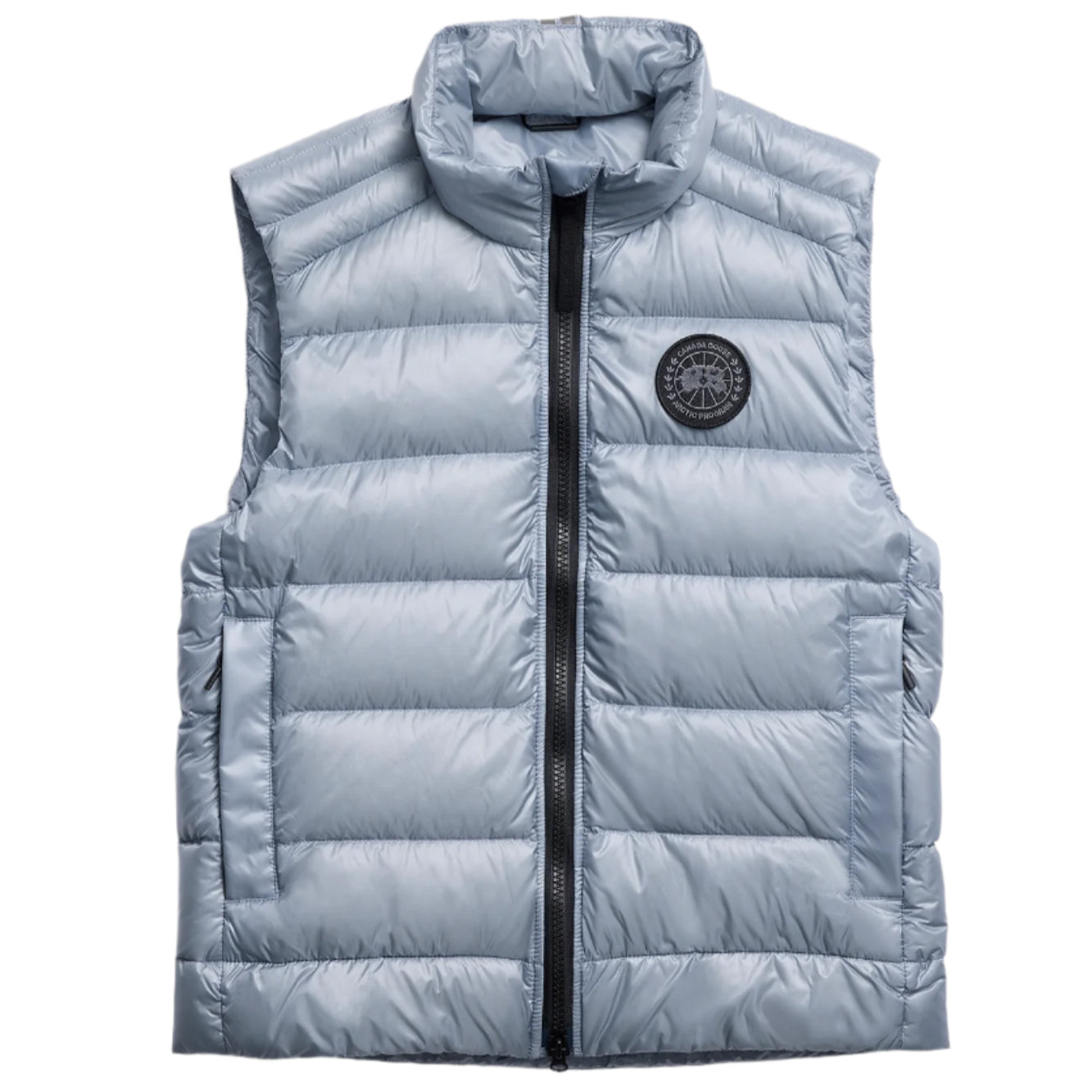 Sleeveless, quilted, silver vest with a full length black zipper.