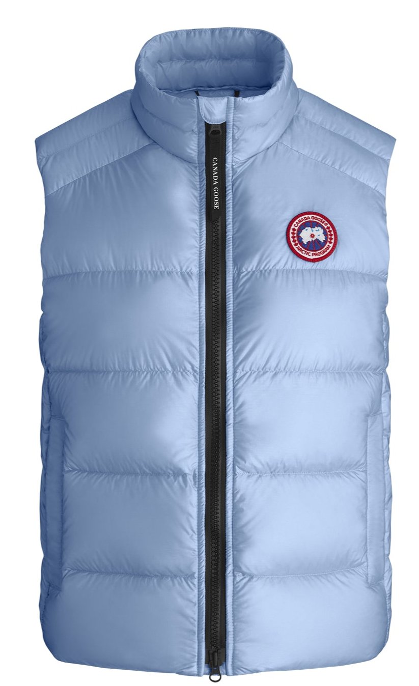 Light blue puffer vest with a front zipper and a circular logo on the chest.