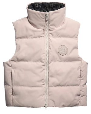 A light beige, sleeveless down puffer vest with a high collar, a central front zipper, and a circular patch logo on the upper left chest.