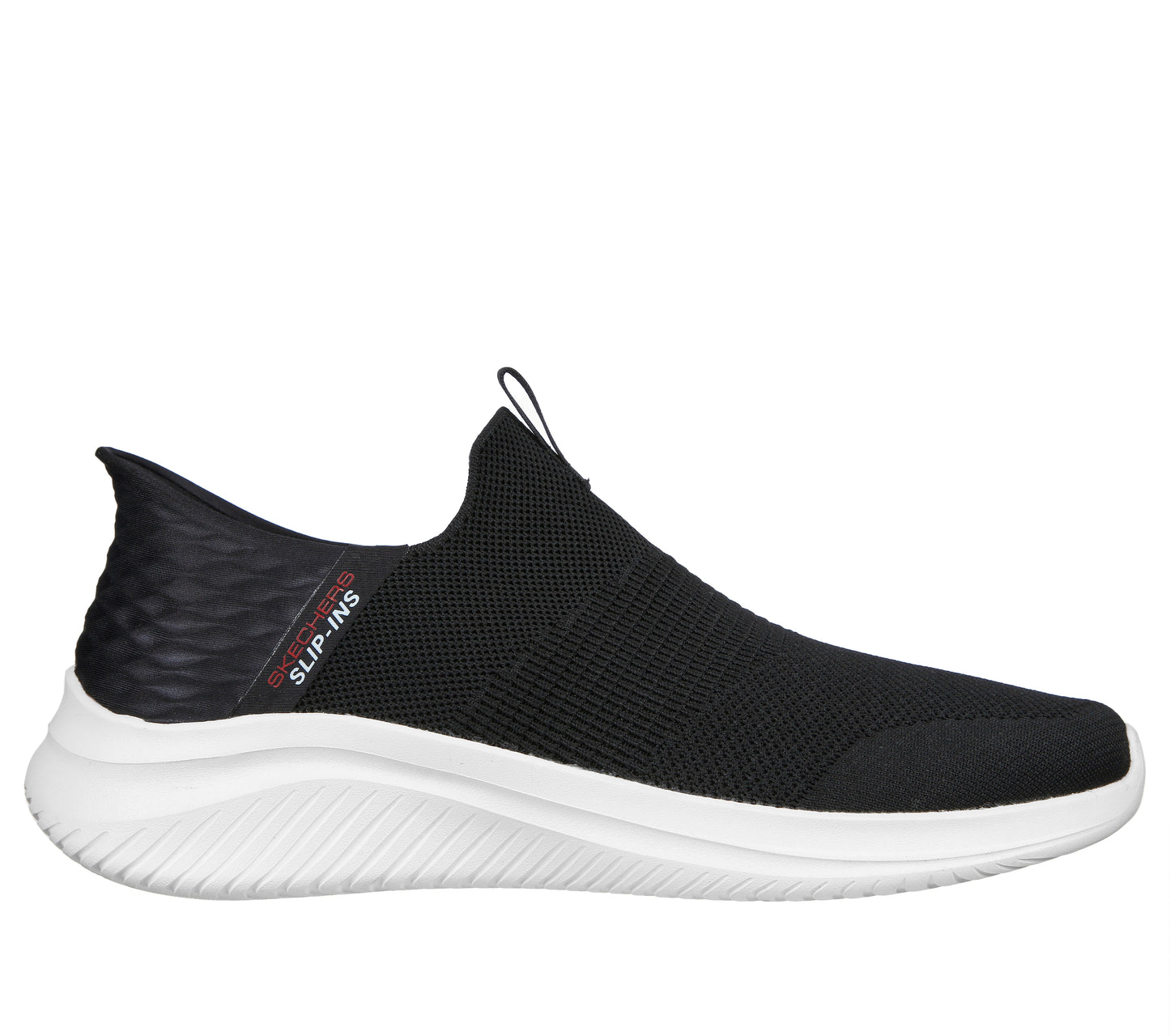 Slip-on style black sneaker with white sole and “SLIP-INS” written on the side.