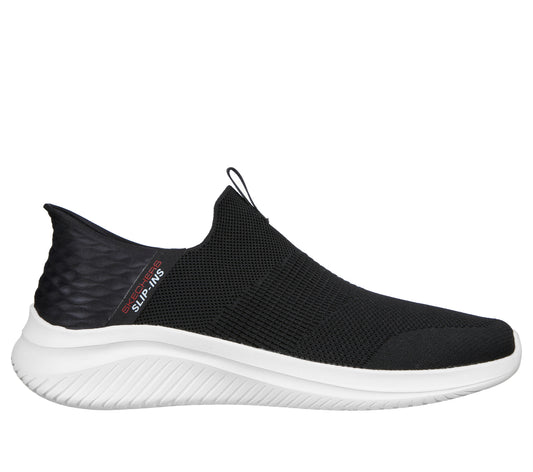 Slip-on style black sneaker with white sole and “SLIP-INS” written on the side.