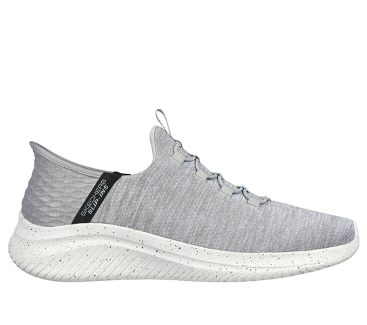 Slip-on light gray sneaker with a white sole and black accent on the back, showing a ribbed heel.