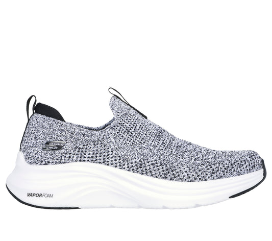 Slip-on sneaker with a white sole and a gray knitted upper with black details.
