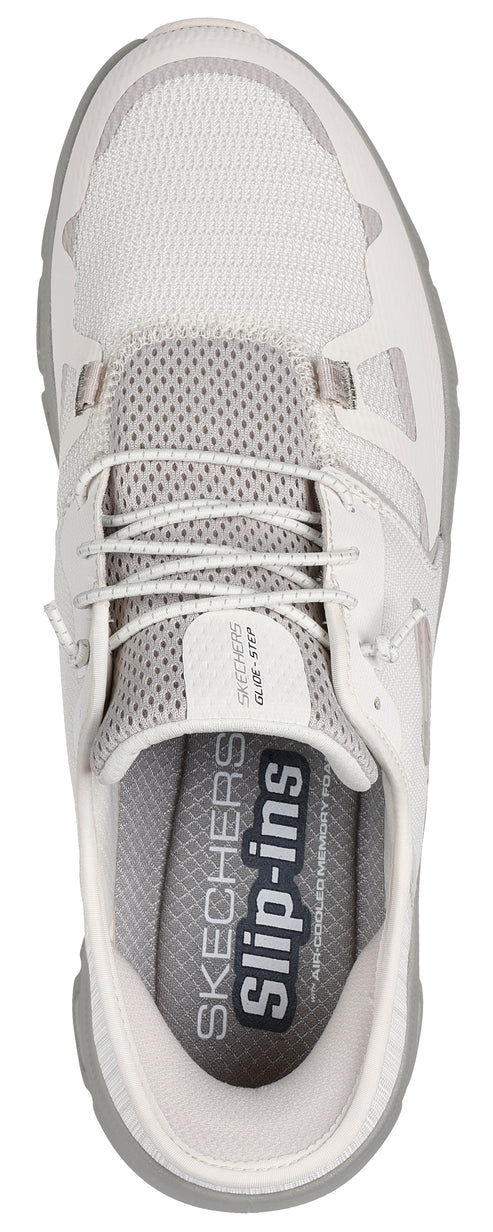 A top-down view of a slip-on shoe with white laces and visible text 'Slip-ins' on the insole.