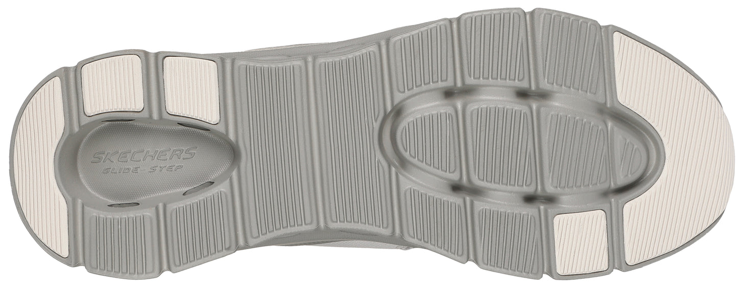 A shoe sole with a gray ribbed texture.