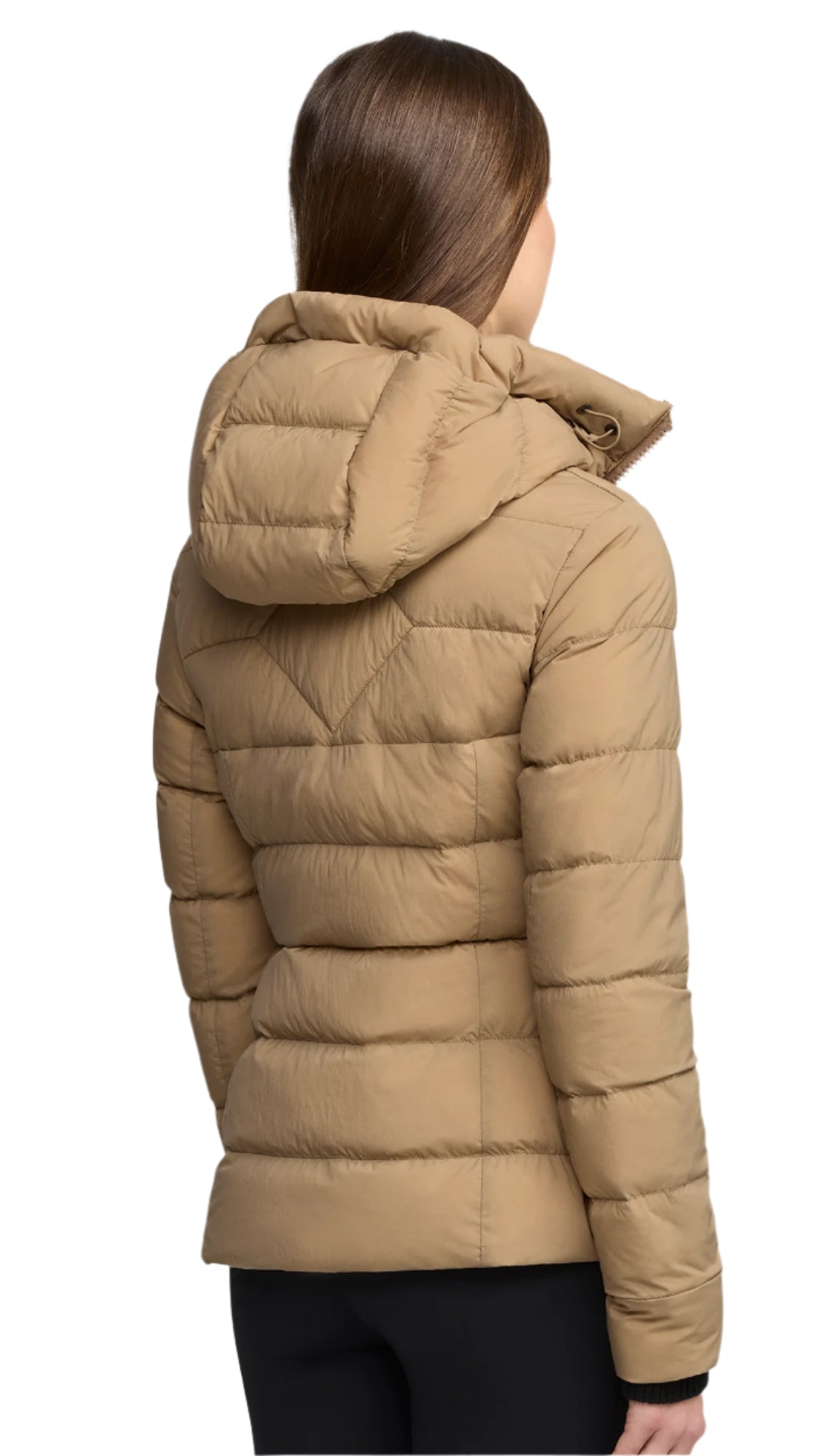 Back view of a tan quilted puffer jacket with a hood, worn by a person.