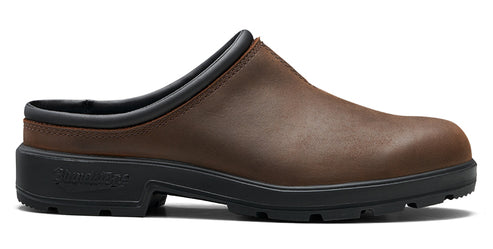 Brown slip-on clog with black sole and collar.