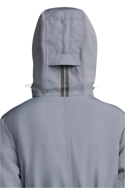 Back view of gray hooded jacket with reflective trim.