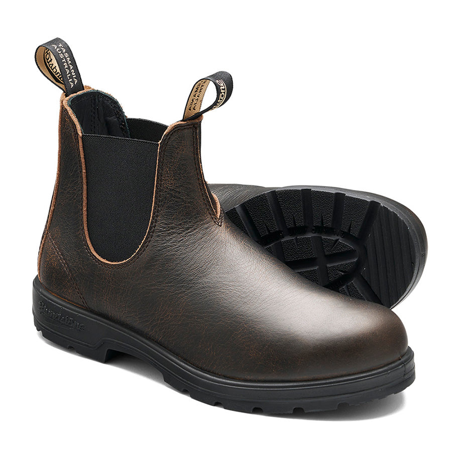 Dark brown ankle-high boots with black elastic side panels and pull tabs.