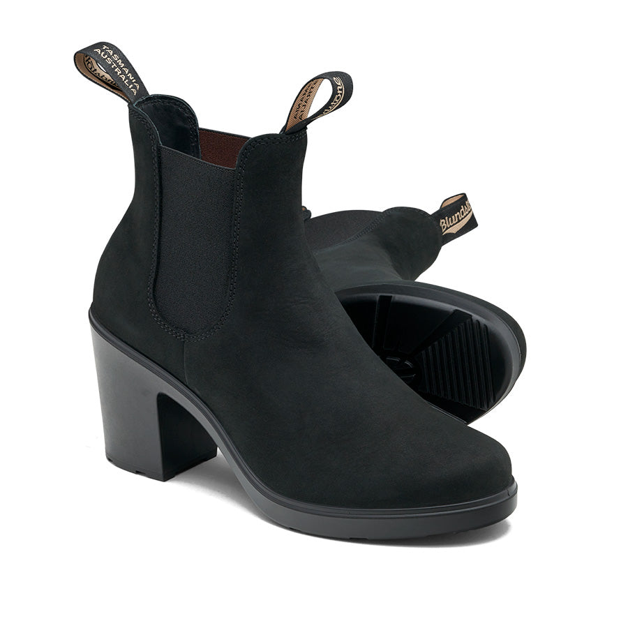 Black, matte ankle-high heeled boots with elastic siding