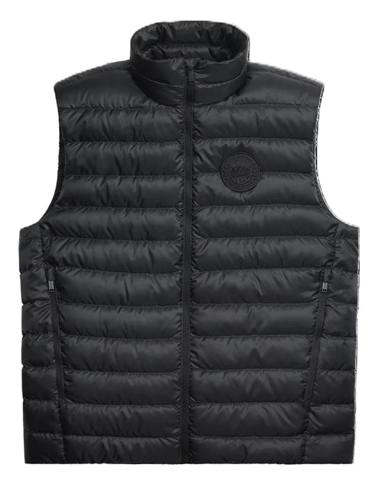 Sleeveless black puffer vest with a high collar and front zipper.