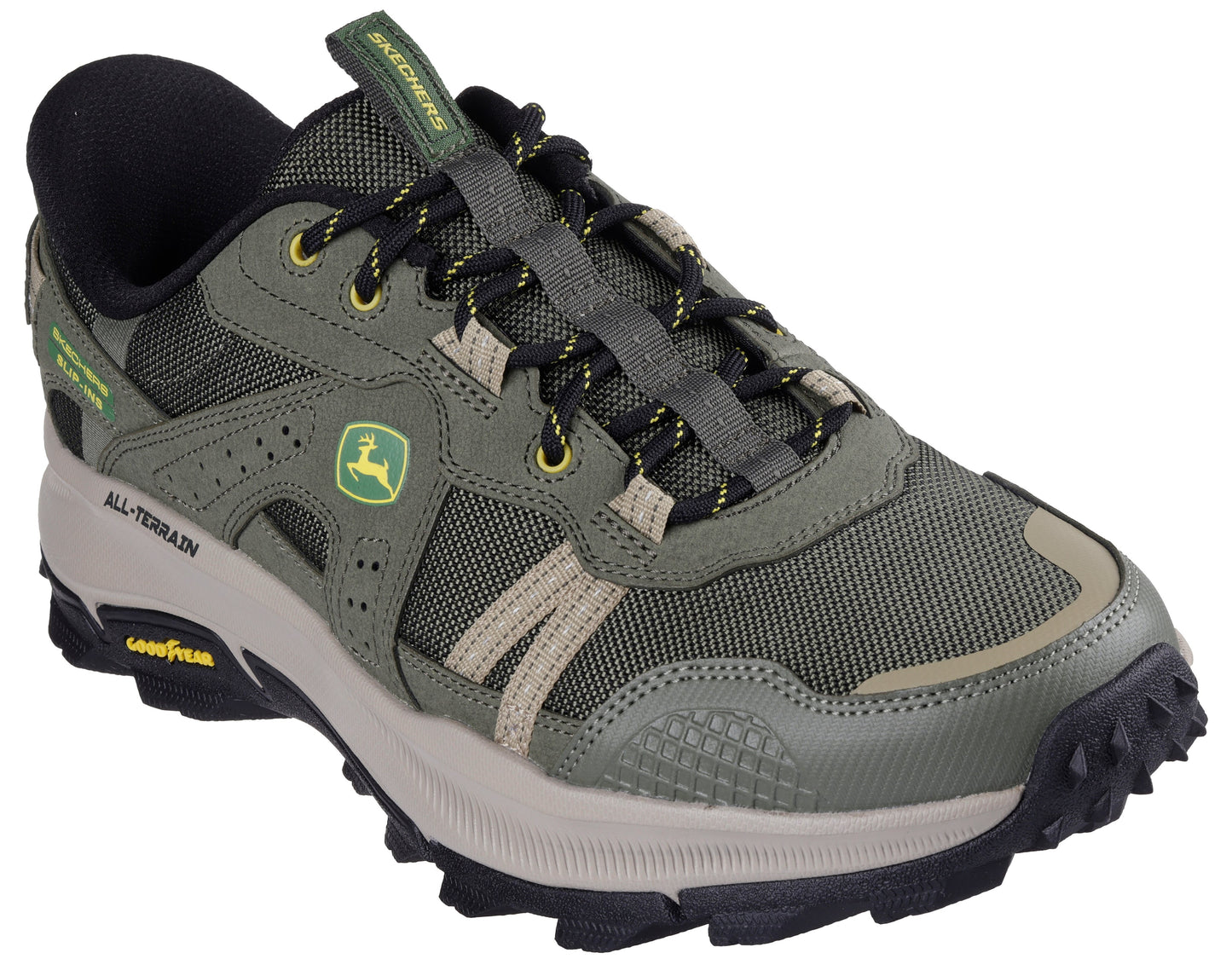Low-profile olive green hiking shoe with black trim, a yellow and green logo on the side, and the text "ALL-TERRAIN" and "GOODYEAR" on the side.