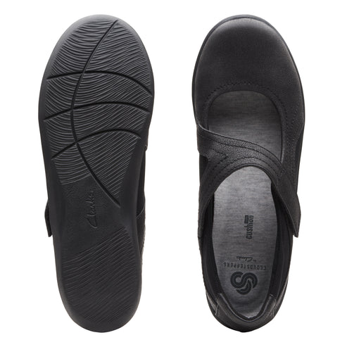 Pair of black Mary Jane style shoes, one showing the treaded sole and the other with a Cloudsteppers insole.