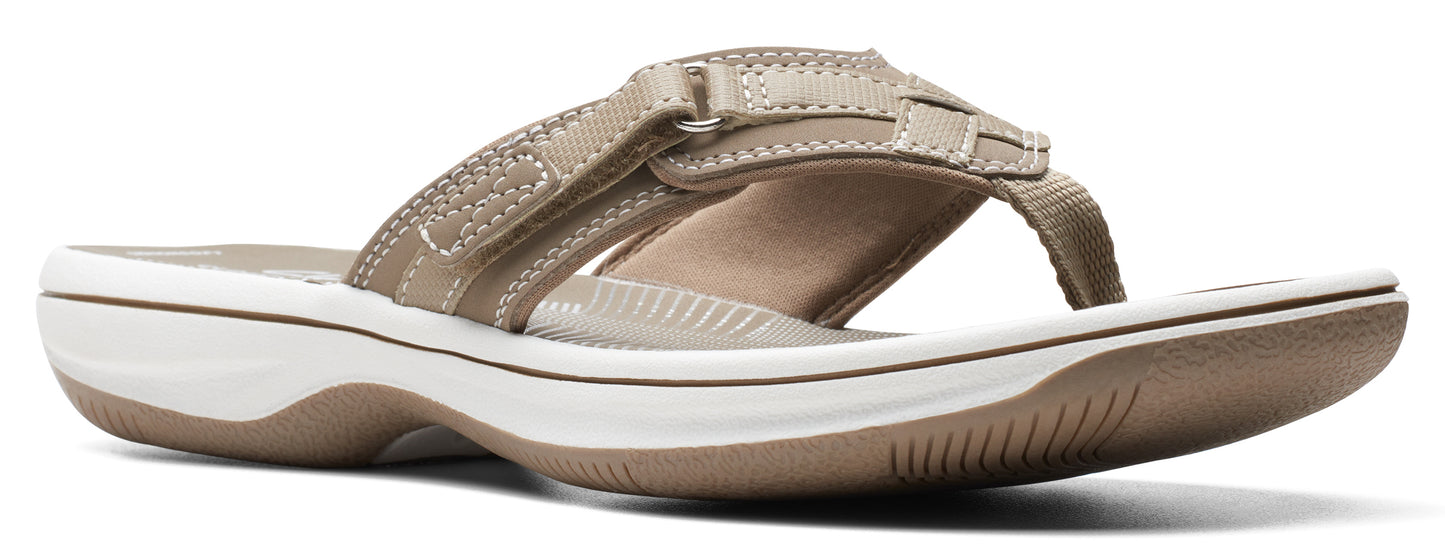 A women's flip-flop sandal in tan.