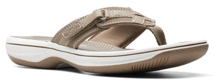 A women's flip-flop sandal in tan.