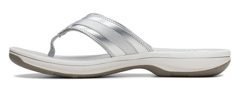 Silver flip-flop sandal with a white footbed and a gray sole.