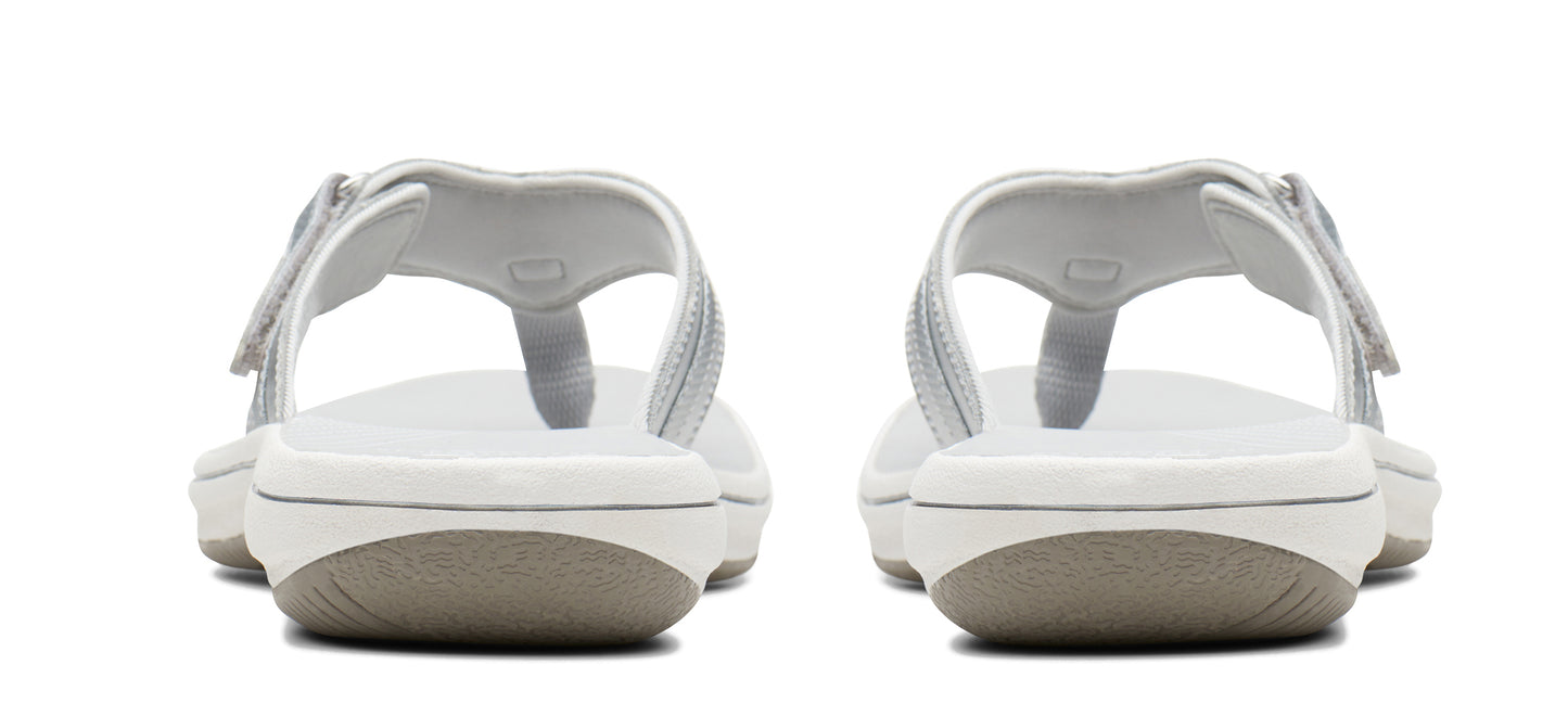 Two sandals from the back with gray straps and soles.