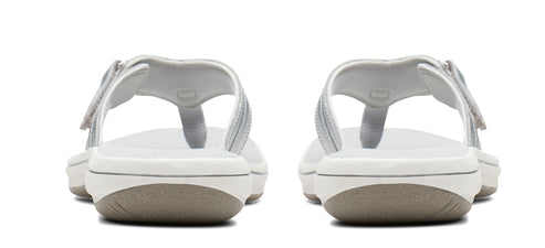 Two sandals from the back with gray straps and soles.