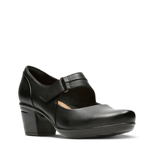 Black women's Mary Jane shoe with a low block heel and hook and loop strap.