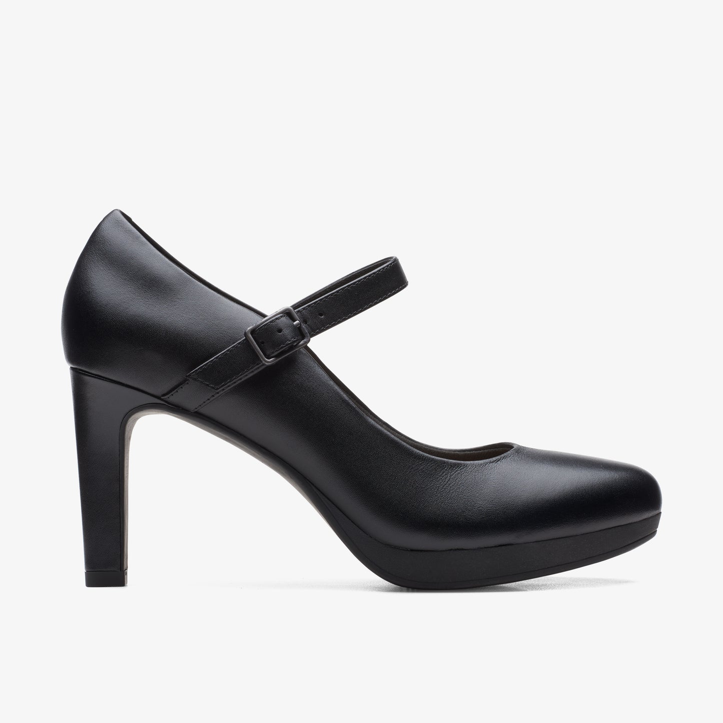 Black, heeled Mary Jane shoe with strap.
