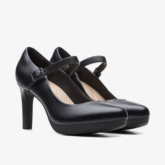 Pair of black, leather, high-heeled Mary Janes.