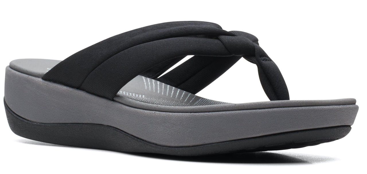 Gray wedge flip-flop with black knotted strap.