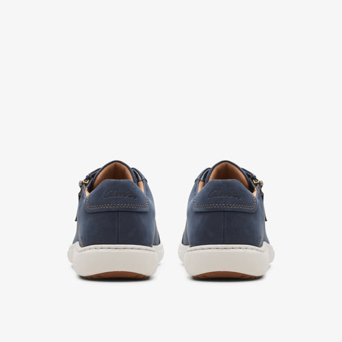 Pair of navy blue low-top sneakers, back view.