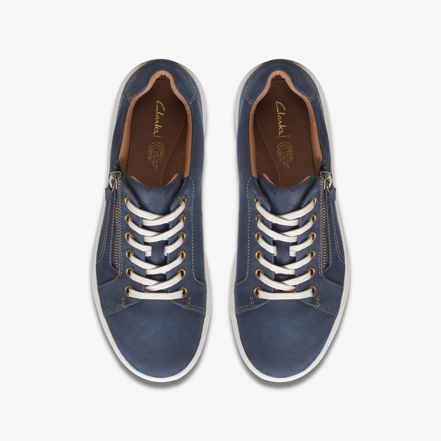 Top-down view of navy blue lace-up sneakers with zippers on either side