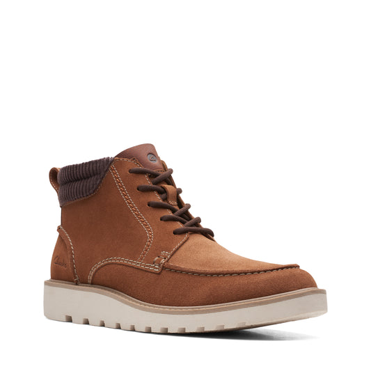 Brown suede boot with a light tan sole.