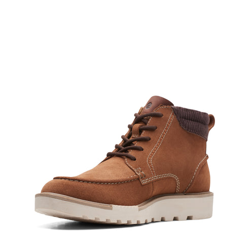Tan-colored leather boot with brown laces and a white sole.