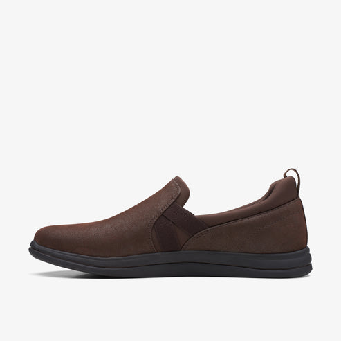Brown slip-on shoe with black sole and elastic insert.