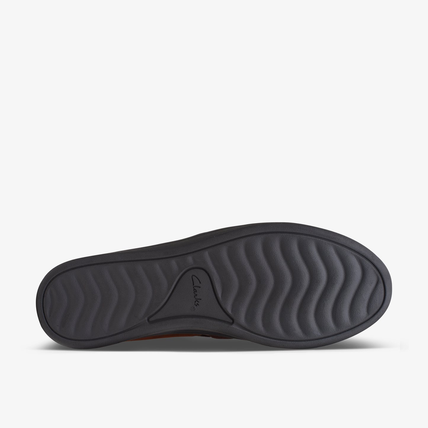 Shoe sole with curved treads and embossed logo.